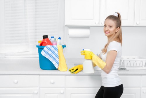 Technician using carpet cleaning machine in a controlled work area