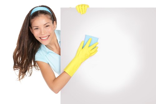 Soft washing a stained wall on a Watford property